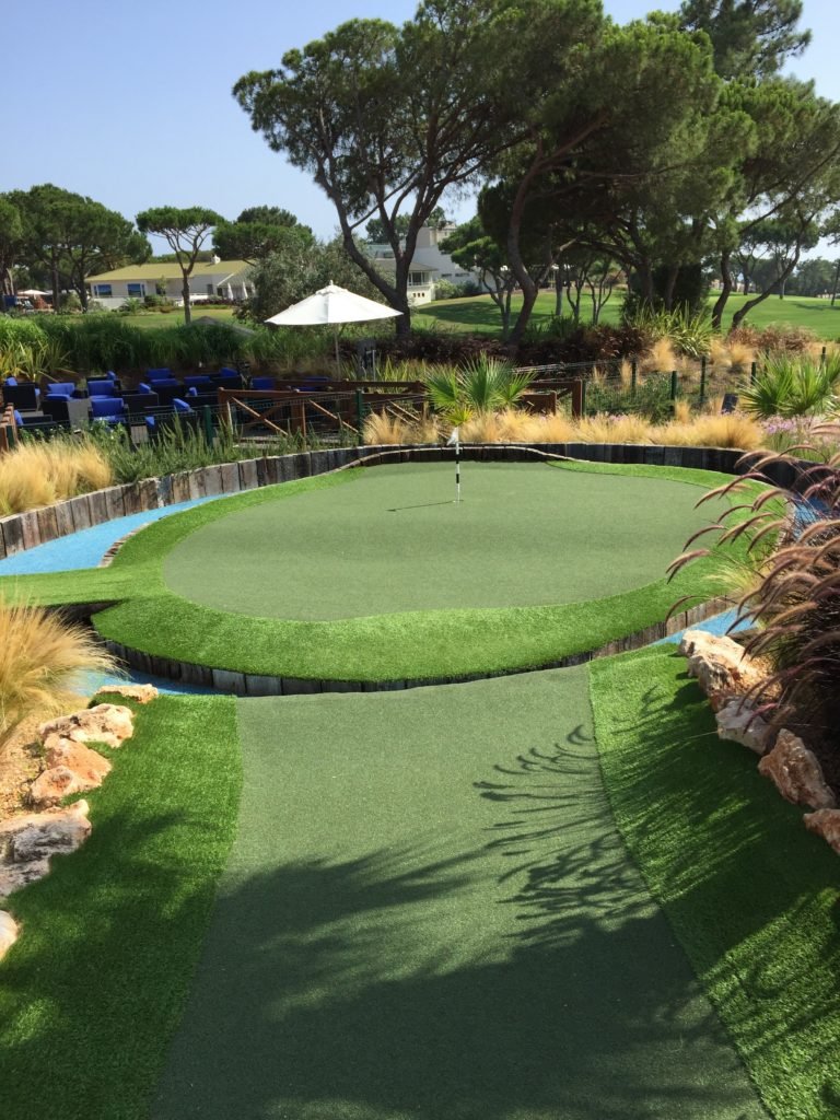 The 17th at the TPC Sawgrass is the inspiration for the last hole at Quinta Mini Golf